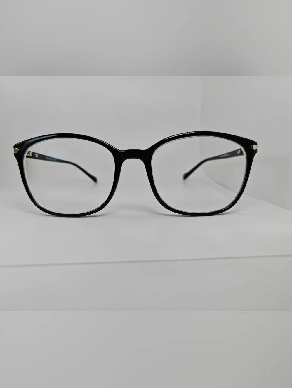 Nola. Classic Black Women's Eyeglass Frames. Gold Shield At Temple Corners.